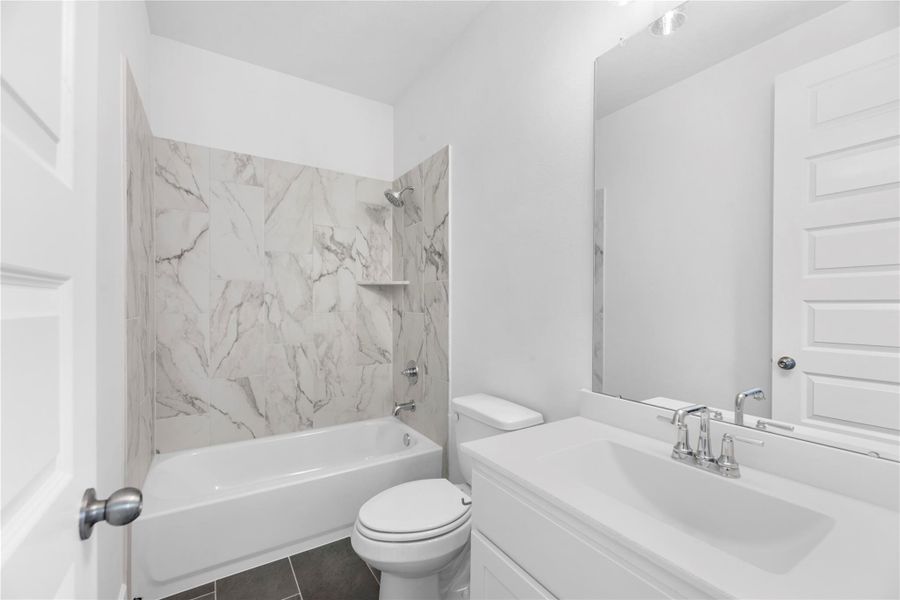 Furnished interior view inside a new home in Bridgeland, Cypress (Image 9).