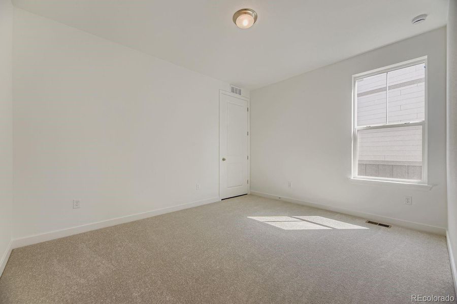 Spacious, unfurnished interior of a new home in Ken-Caryl Ranch: The Monarch Collection, Littleton (Image 12).