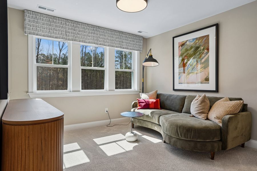 Representative furnished interior of a home built from the Roanoke by Caruso Homes in Magnolia Acres, Fuquay Varina (Image 10).