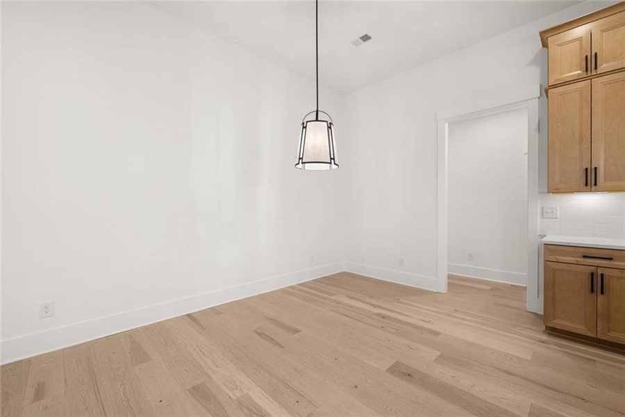 Spacious, unfurnished interior of a new home in Soleil Belmont Park, Canton (Image 52).