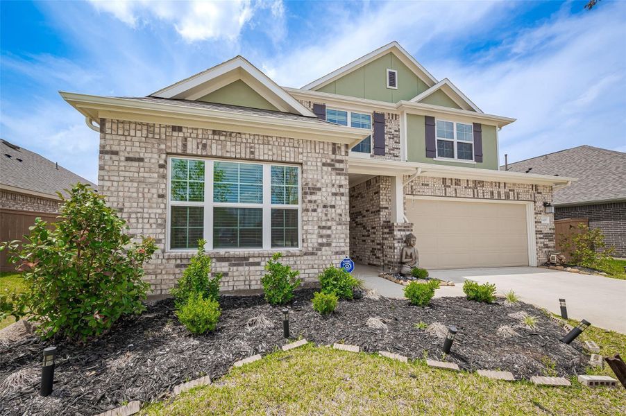 Front exterior of a new home in Marvida, Cypress, TX, highlighting curb appeal (Image 21).