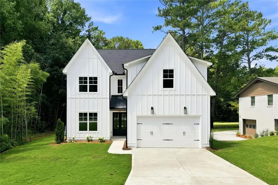Front exterior of a new home in , Marietta, GA, highlighting curb appeal (Image 27).