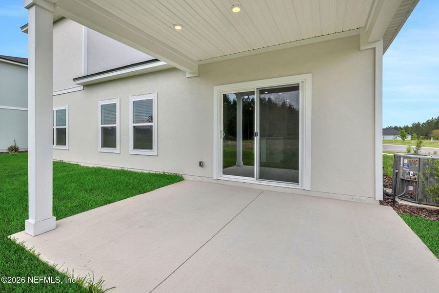 Exterior details and patio area of a home in Amberly, Green Cove Springs (Image 26).