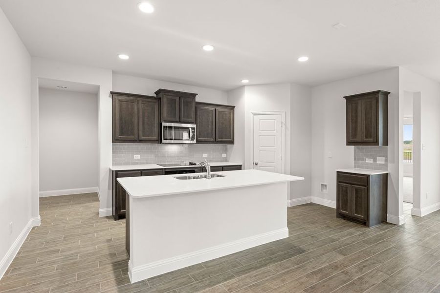 Representative exterior photo of a completed home built from the Newport by Impression Homes in Mercer Meadows, Royse City, TX (Image 7). Representative exterior photo of a completed home built from the Newport by Impression Homes in Mercer Meadows, Royse City, TX (Image 7).