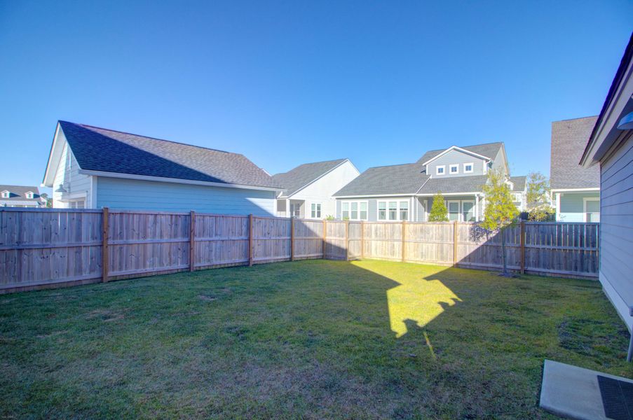 Exterior details and patio area of a home in Carnes Crossroads: Row Collection, Summerville (Image 18). Exterior details and patio area of a home in Carnes Crossroads: Row Collection, Summerville (Image 18).