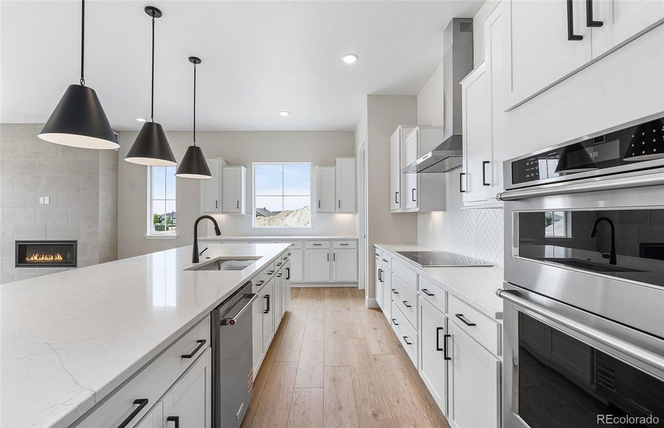 Furnished interior view inside a new home in Hilltop at Inspiration, Aurora (Image 16).