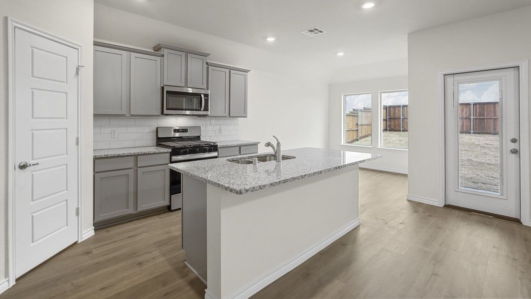Furnished interior view inside a new home in Woodcreek, Fate (Image 4).
