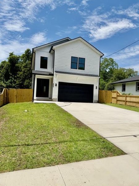 Front exterior of a new home in , North Charleston, SC, highlighting curb appeal (Image 2). Front exterior of a new home in , North Charleston, SC, highlighting curb appeal (Image 2).