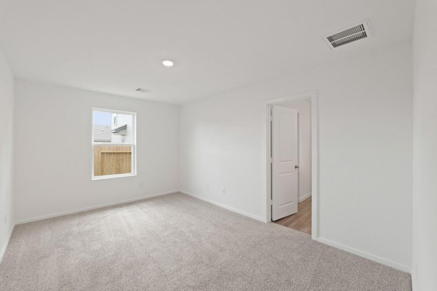 Spacious, unfurnished interior of a new home in The Canopies, Splendora (Image 14).