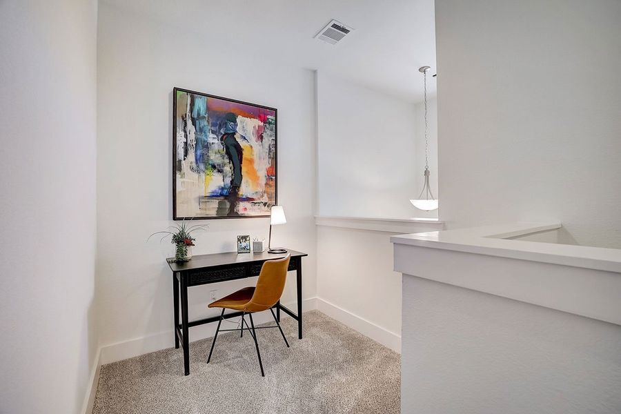 Representative furnished interior of a home built from the Comal by Pacesetter Homes in Avery Centre, Round Rock (Image 7).
