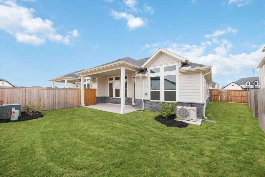 Exterior details and patio area of a home in Elyson, Katy (Image 23).