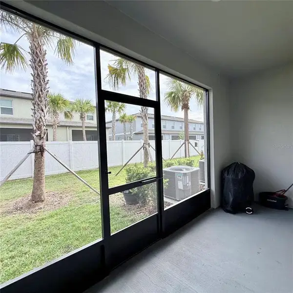 Exterior details and patio area of a home in , Zephyrhills (Image 4).