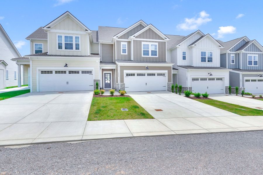 Front exterior of a new home in Harvest Point, Spring Hill, TN, highlighting curb appeal (Image 6). Front exterior of a new home in Harvest Point, Spring Hill, TN, highlighting curb appeal (Image 6).