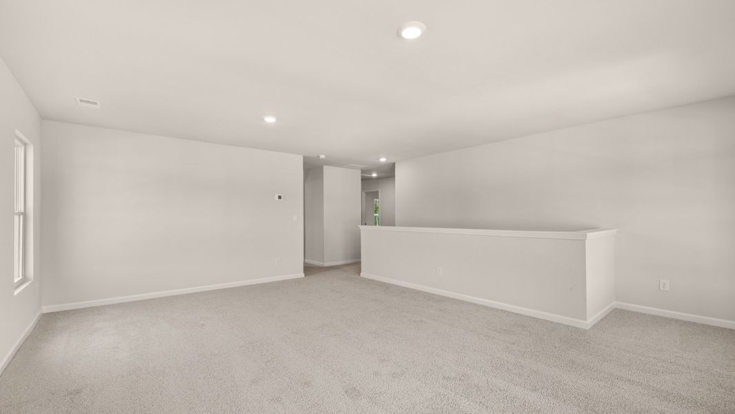 Representative unfurnished interior of a home built from the Elle by D.R. Horton in South Wind, South Fulton (Image 26).