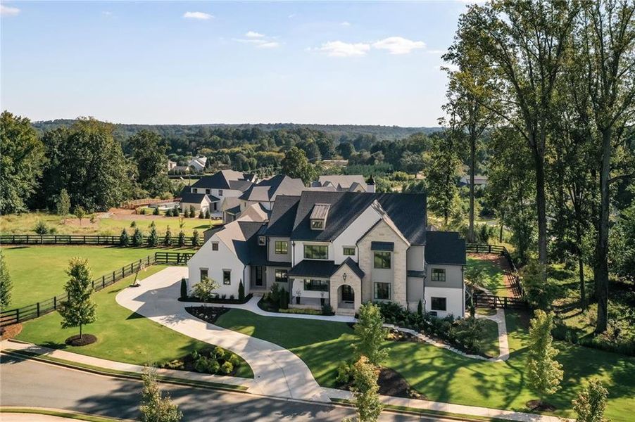 Front exterior of a new home in , Milton, GA, highlighting curb appeal (Image 22).