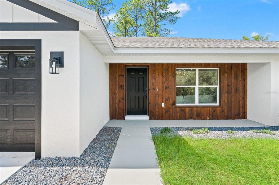 Exterior details and patio area of a home in , Citrus Springs (Image 31).