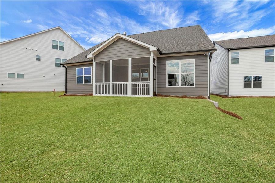 Exterior details and patio area of a home in Twin Lakes, Hoschton (Image 26).