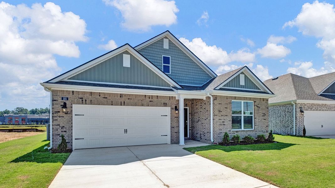 Front exterior of a new home in Shiloh Springs, Jackson, TN, highlighting curb appeal (Image 2). Front exterior of a new home in Shiloh Springs, Jackson, TN, highlighting curb appeal (Image 2).