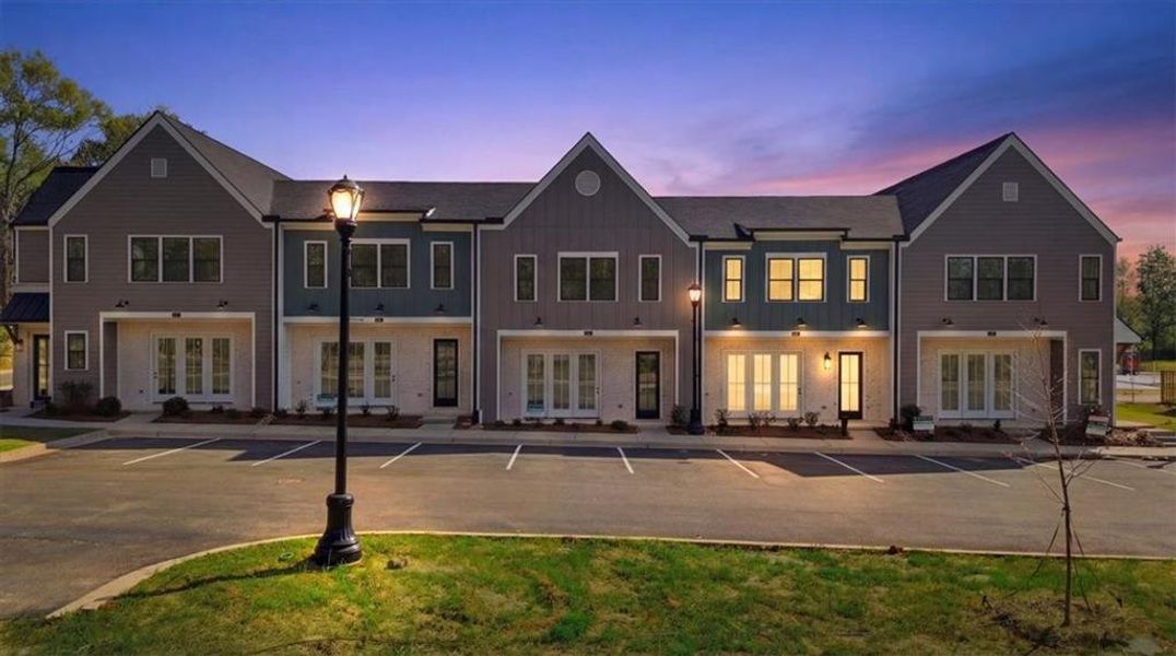 Front exterior of a new home in Laurel Park, Braselton, GA, highlighting curb appeal (Image 1). Front exterior of a new home in Laurel Park, Braselton, GA, highlighting curb appeal (Image 1).