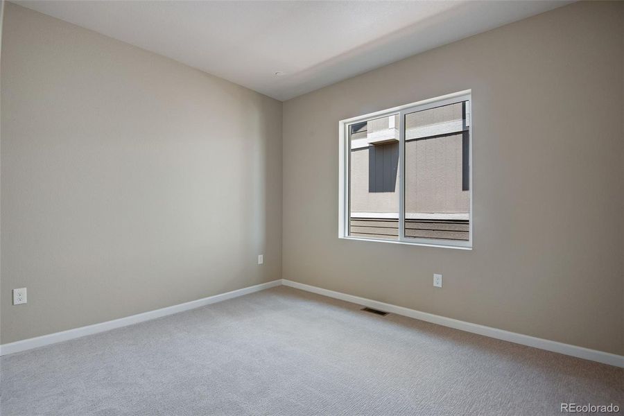 Spacious, unfurnished interior of a new home in Reunion Ridge, Commerce City (Image 22).