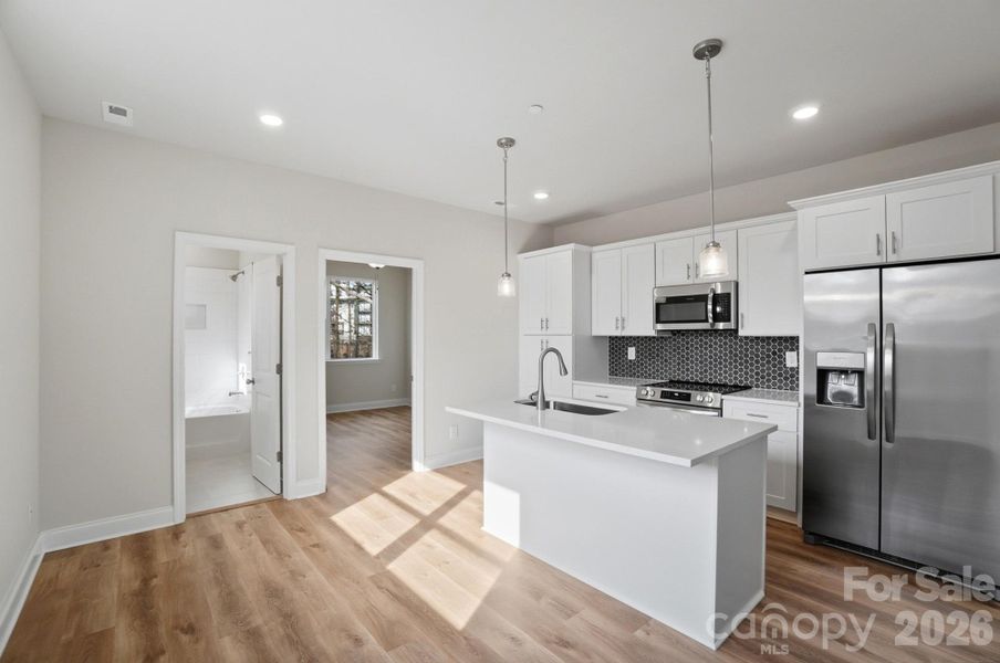 Furnished interior view inside a new home in , Charlotte (Image 8). Furnished interior view inside a new home in , Charlotte (Image 8).