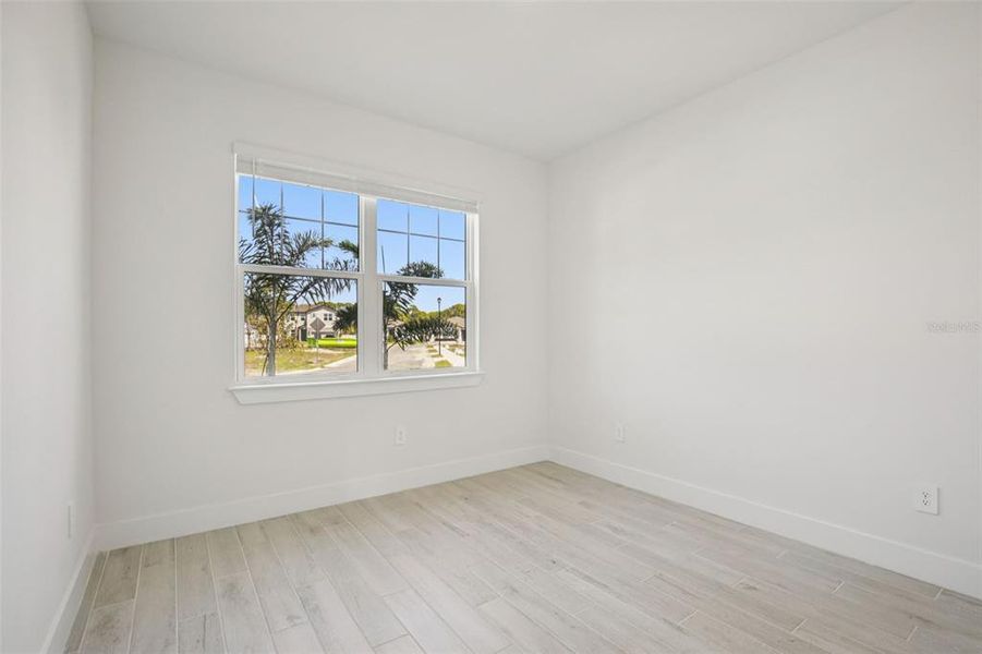 Spacious, unfurnished interior of a new home in Magnolia Bay - Reserve Series, Nokomis (Image 17).