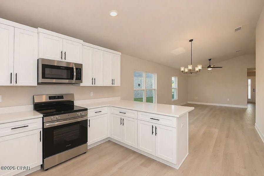 Furnished interior view inside a new home in College Station, Panama City (Image 7).