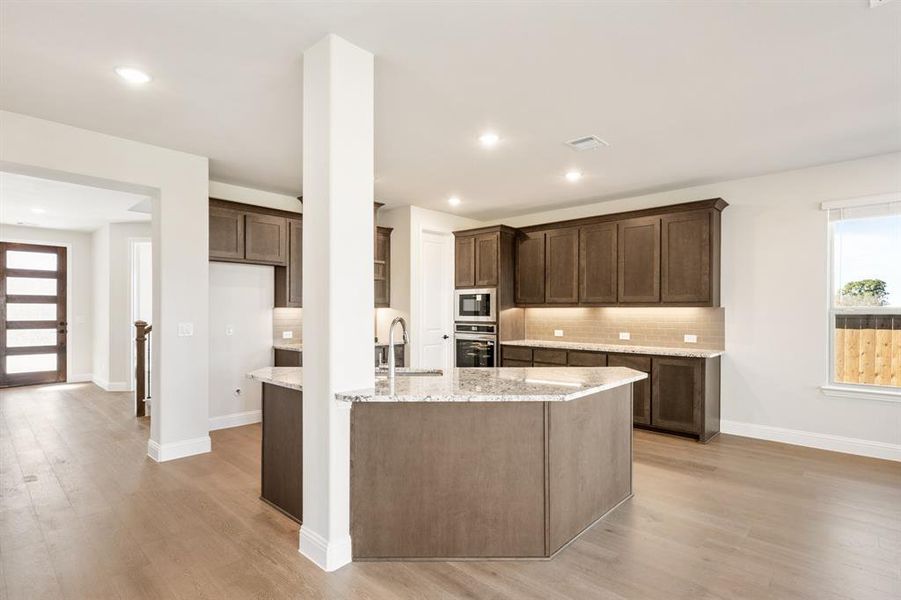 Furnished interior view inside a new home in Creekview Meadows, Pilot Point (Image 13).