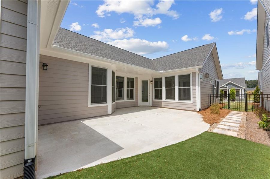 Exterior details and patio area of a home in The Courtyards at Bailey Farms, Dacula (Image 3).