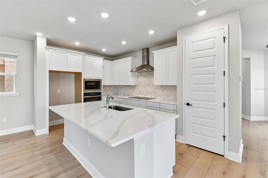 Furnished interior view inside a new home in Weslyn Park in Sunbridge 34', St. Cloud (Image 7).