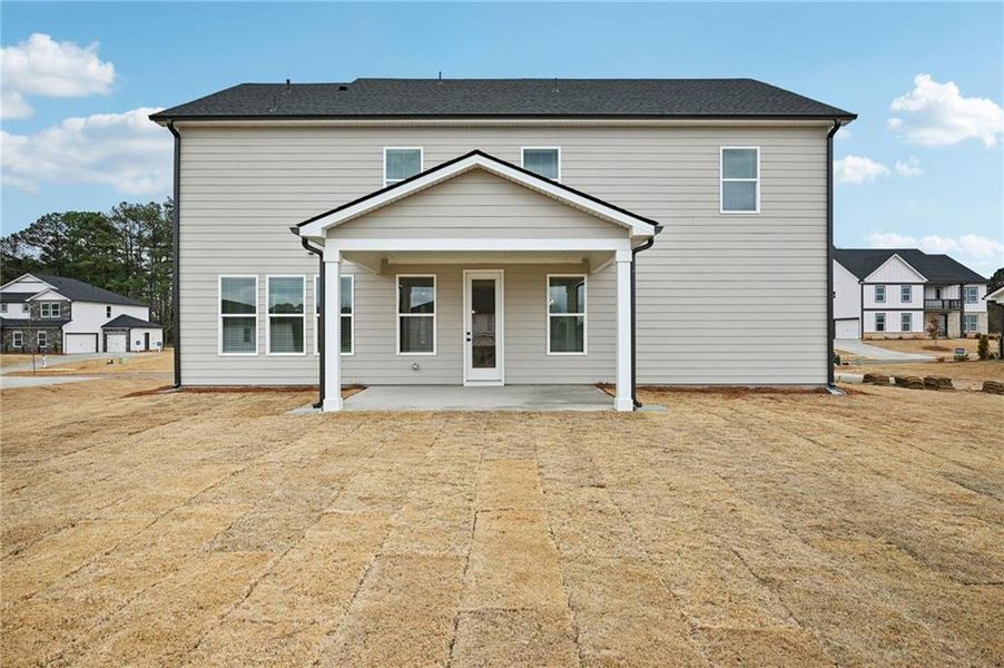 Exterior details and patio area of a home in River Pointe, Monroe (Image 3).