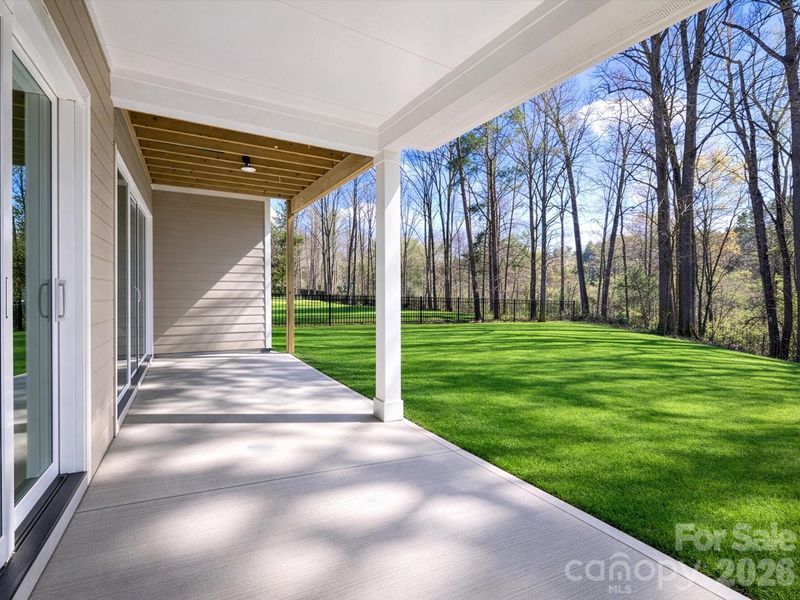 Exterior details and patio area of a home in North Creek Village, Huntersville (Image 27).