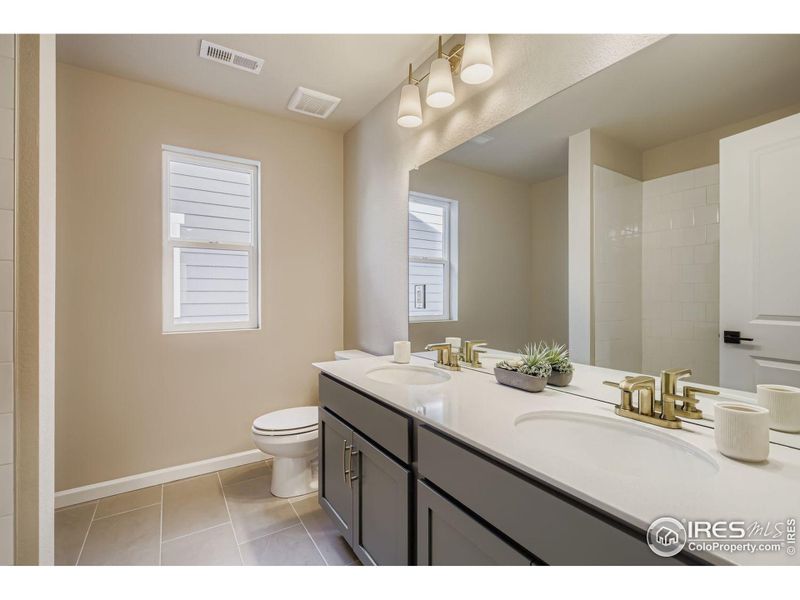 Shared upper level full bathroom