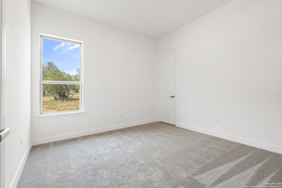 Spacious, unfurnished interior of a new home in Legend Park, Castroville (Image 21). Spacious, unfurnished interior of a new home in Legend Park, Castroville (Image 21).