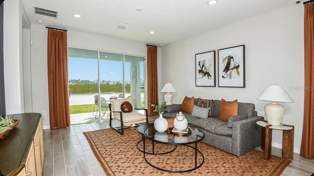 Furnished interior view inside a new home in Center Lake Ranch Community Group Page, St. Cloud (Image 6).