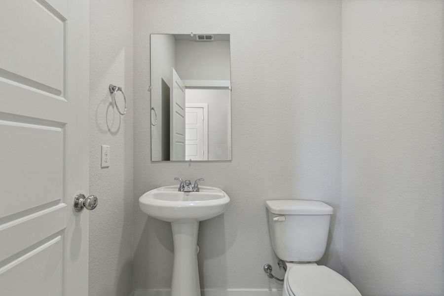 Bathroom in the Willow home plan by Trophy Signature Homes – REPRESENTATIVE PHOTO