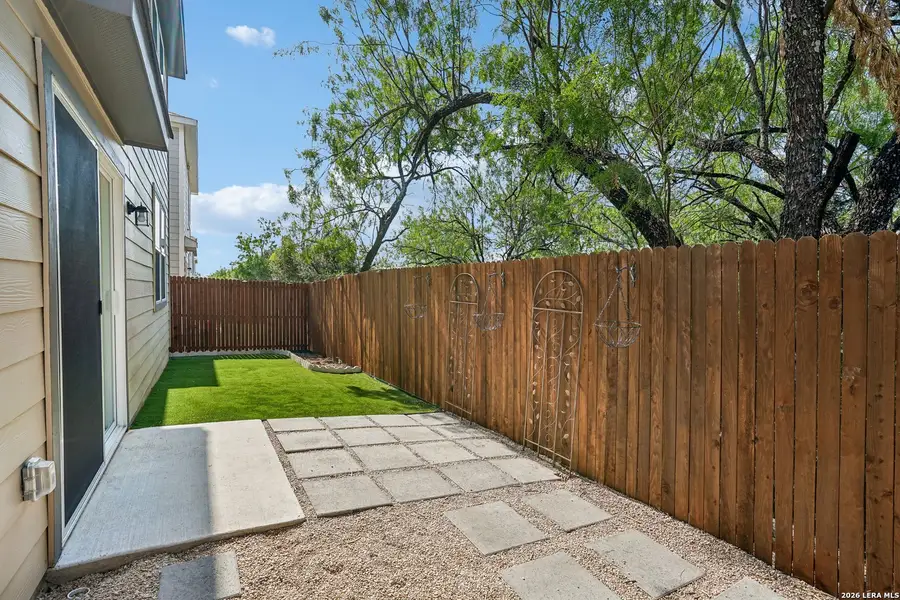Exterior details and patio area of a home in University Village, San Antonio (Image 3).