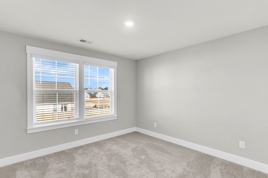 Spacious, unfurnished interior of a new home in Hewing Farms, Summerville (Image 36).