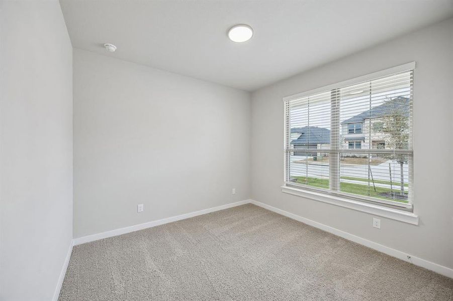 Bedroom in the Stanley II home plan by Trophy Signature Homes – REPRESENTATIVE PHOTO