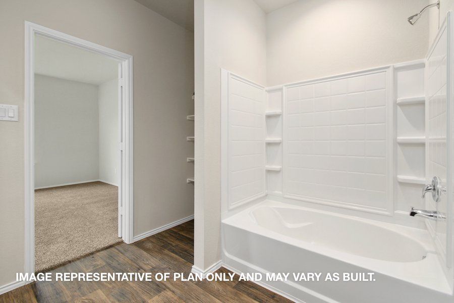 Representative furnished interior of a home built from the Ozark by D.R. Horton in Harrington Trails at The Canopies, New Caney (Image 11).