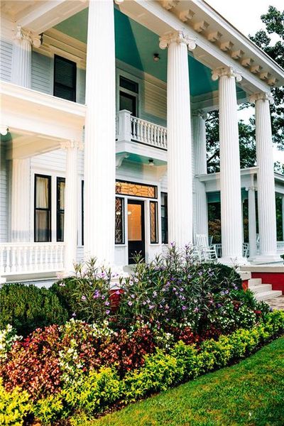 Front exterior of a new home in Rosewood Lake Estates, Hoschton, GA, highlighting curb appeal (Image 1).