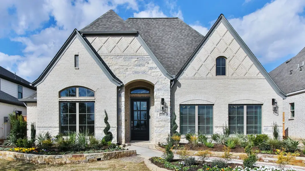 Front exterior of a new home in North Sky, Celina, TX, highlighting curb appeal (Image 21). Front exterior of a new home in North Sky, Celina, TX, highlighting curb appeal (Image 21).
