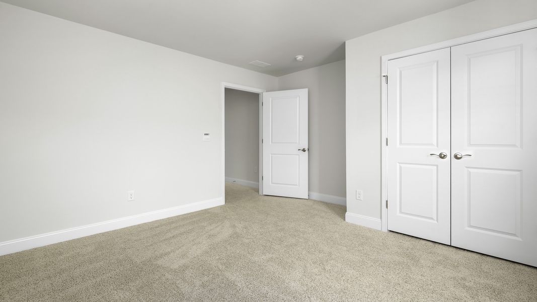 Spacious, unfurnished interior of a new home in The Villas at Kinsley, Jamestown (Image 18).