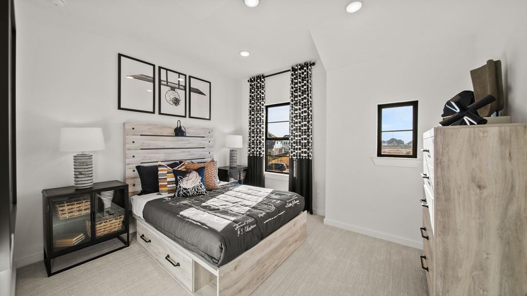 Charming windows, including a window in the closet, make this secondary bedroom stand out. Charming windows, including a window in the closet, make this secondary bedroom stand out.