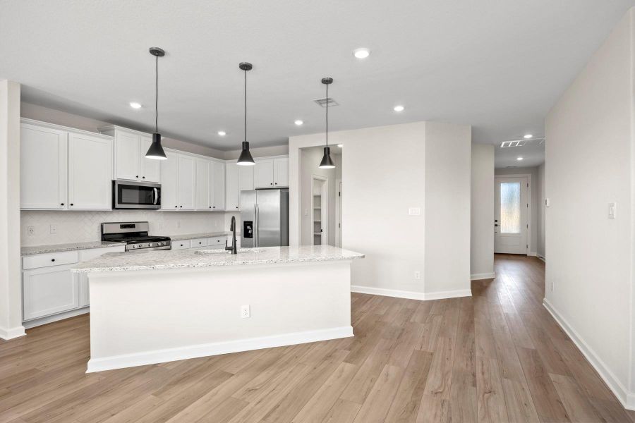 Furnished interior view inside a new home in Sunterra, Katy (Image 4).