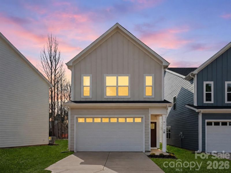 Front exterior of a new home in , Charlotte, NC, highlighting curb appeal (Image 26). Front exterior of a new home in , Charlotte, NC, highlighting curb appeal (Image 26).