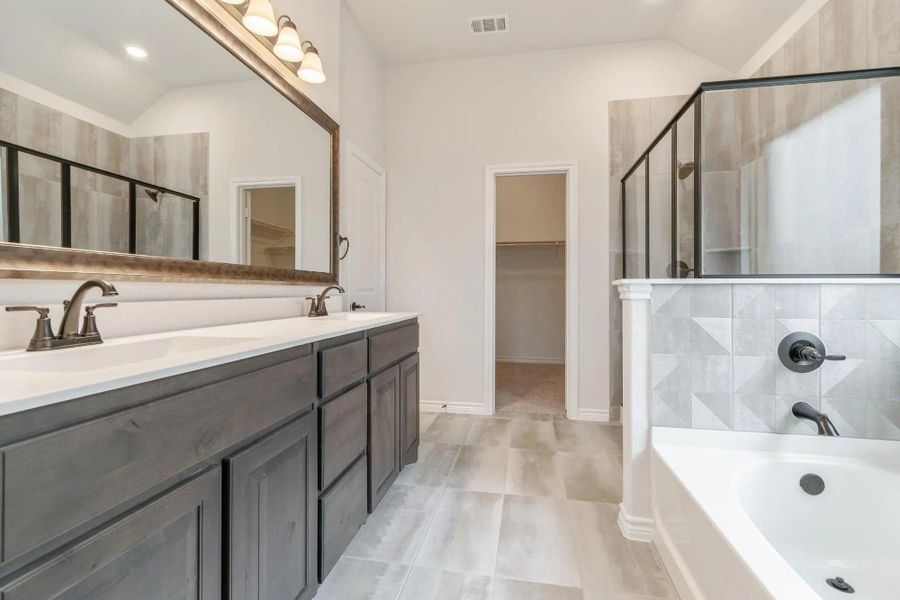 Primary Bathroom | Concept 1841 at Coyote Crossing in Godley, TX by Landsea Homes