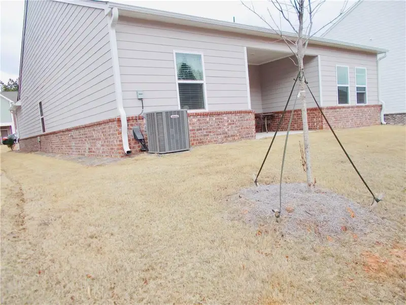 Exterior details and patio area of a home in Ashford Park, Covington (Image 3).