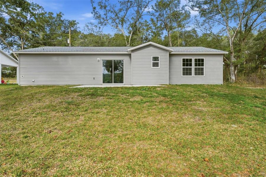 Exterior details and patio area of a home in , Ocklawaha (Image 24).