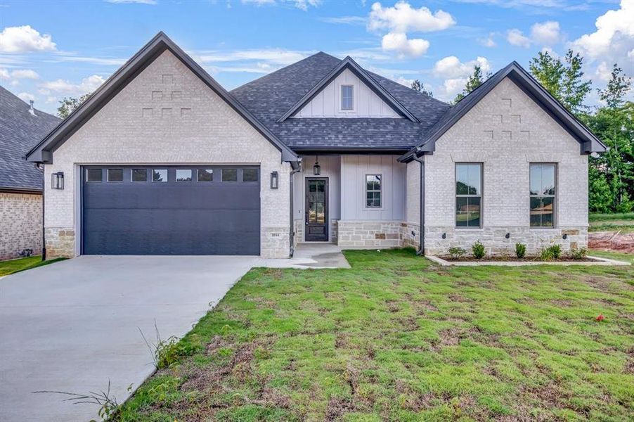 Front exterior of a new home in , Tyler, TX, highlighting curb appeal (Image 2).